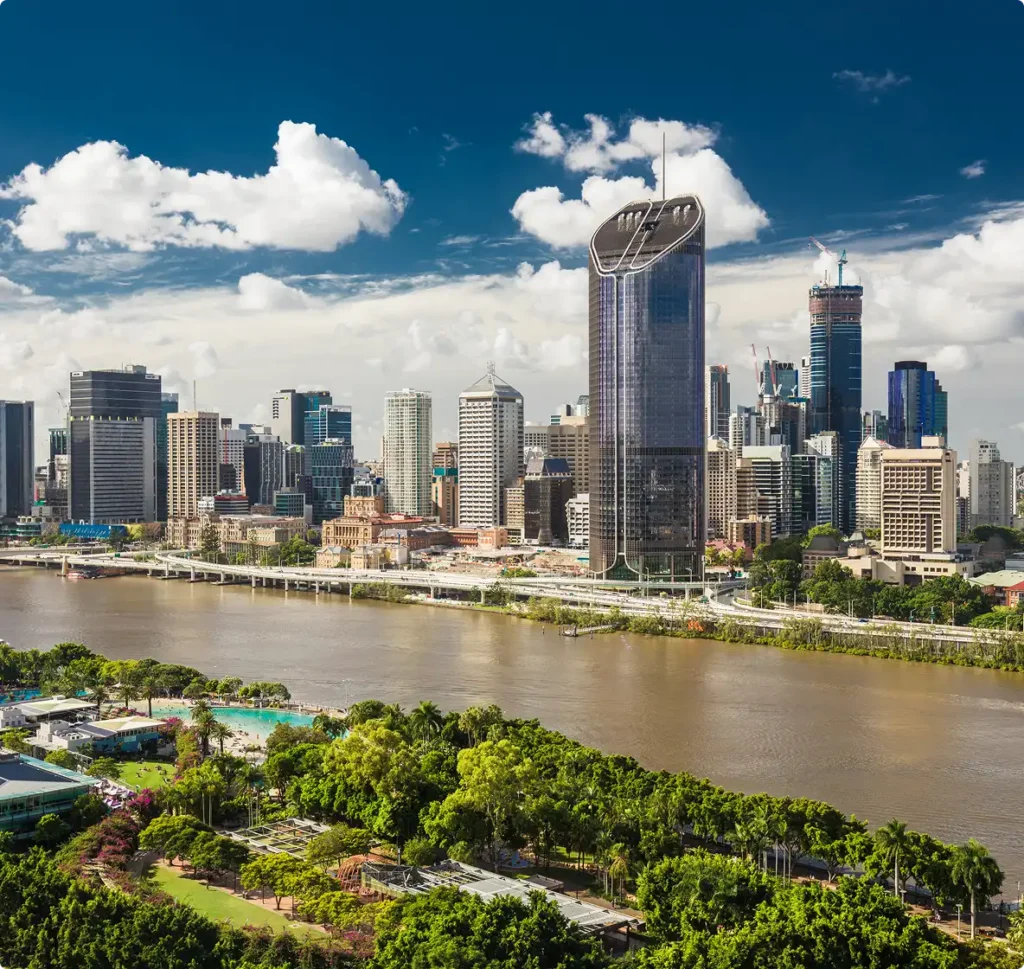 Brisbane skyline along river with modern skyscrapers